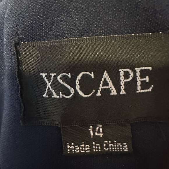 Elegant Navy Evening Gown with Beautiful Beaded Neckline and Flutter Sleeves - Picture 6 of 7